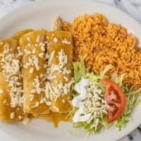 Enchiladas Verdes · (3) Green chile sauce topped enchiladas 1 beef, 1 chicken, one cheese, topped with lettuce, ...