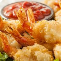 Crunchy Shrimp · Crunchy breaded jumbo shrimp with cocktail sauce.