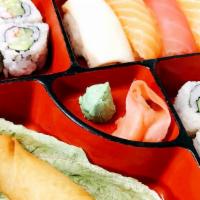 (D) Sushi Dinner Bento · Served with soup, salad, spring roll, California (Eight pieces) and sushi (Four pieces).