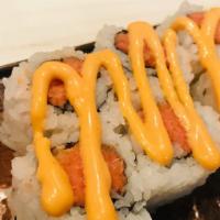Spicy Tuna Roll · Spicy tuna, scallion, masago spicy mayonnaise, sesame seed wrapped in rice.