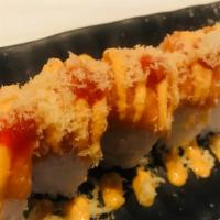 Spicy Girl · Spicy tuna and tempura crunch with spicy salmon tempura crunch on top.