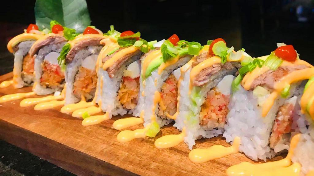 Rich Roll · spicy crabmeat and cream cheese inside,beef and avocado scallions on top