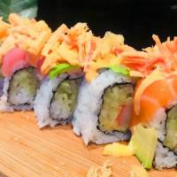 Island Treasure Roll · tempura crabmeat and cucumber inside , w.  variety of fish and avocado outside and spicy cra...