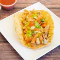 Pollo Asado Taco · Grilled chicken, guacamole and pico de gallo