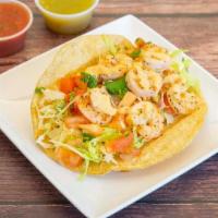 Shrimp Taco · Grilled shrimp, cabbage, pico de gallo, creamy chipotle sauce and lime