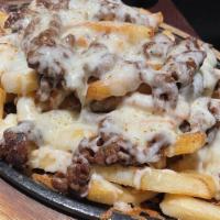 Belly Fries · Fries topped with pork belly and cheese.