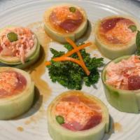 Lily Roll (Riceless Roll) · Tuna, salmon, yellowtail, crabmeat, asparagus, wrapped salmon with cucumber. Apple sauce and...