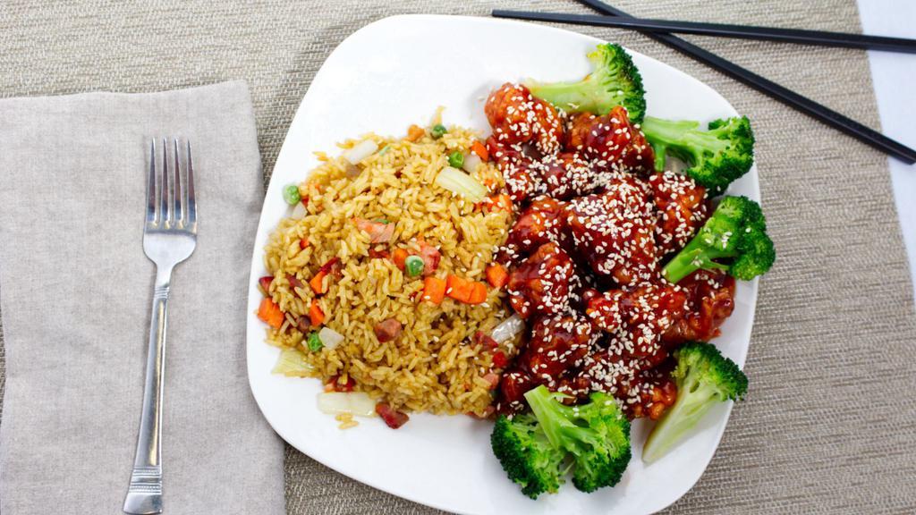 Sesame Chicken · Served with chicken fried rice or steamed rice and soda or soup (wonton egg drop or hot and sour).