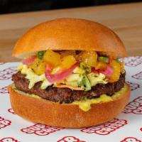 Curry Burger · Curry slaw, pineapple chutney, pickled red onion and pickled ginger,  curry mayo, scallion.