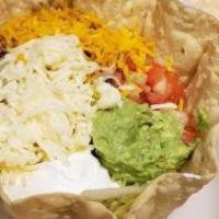 Taco Salad · Crispy flour tortilla shell. Filled with fresh lettuce, tomatoes, cheese, sour cream, guacam...