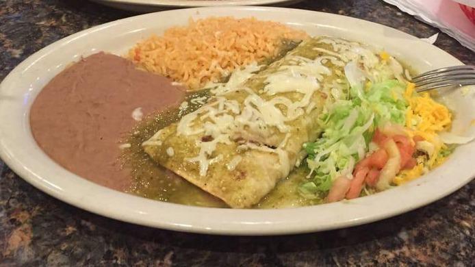 Tex Mex Enchiladas · Topped with meat sauce and melted cheese.