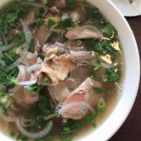18 🍜 Phở Tái Nam Gầu - Gân – Sách · Beef noodle soup with eye round steak, well done flank, fat brisket, soft tendon, and beef t...