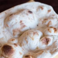 Naan · Soft white flour bread.