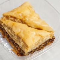 Baklava · A rich, sweet dessert pastry made of layers of filo filled with chopped nuts and covered in ...
