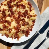 Bacon Mac & Cheese · Rotini noodles tossed in a decadent cheese sauce made with five italian cheeses. Finished wi...