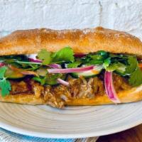 Korean Bbq Pulled Pork Sandwich · Smoked pulled pork tossed in Korean-Style BBQ Sauce and topped with fresh cilantro, quick-pi...