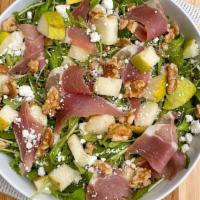 Goat Cheese & Pear · Fresh pear, thinly sliced prosciutto, walnuts, crumbled goat cheese, arugula and honey drizz...
