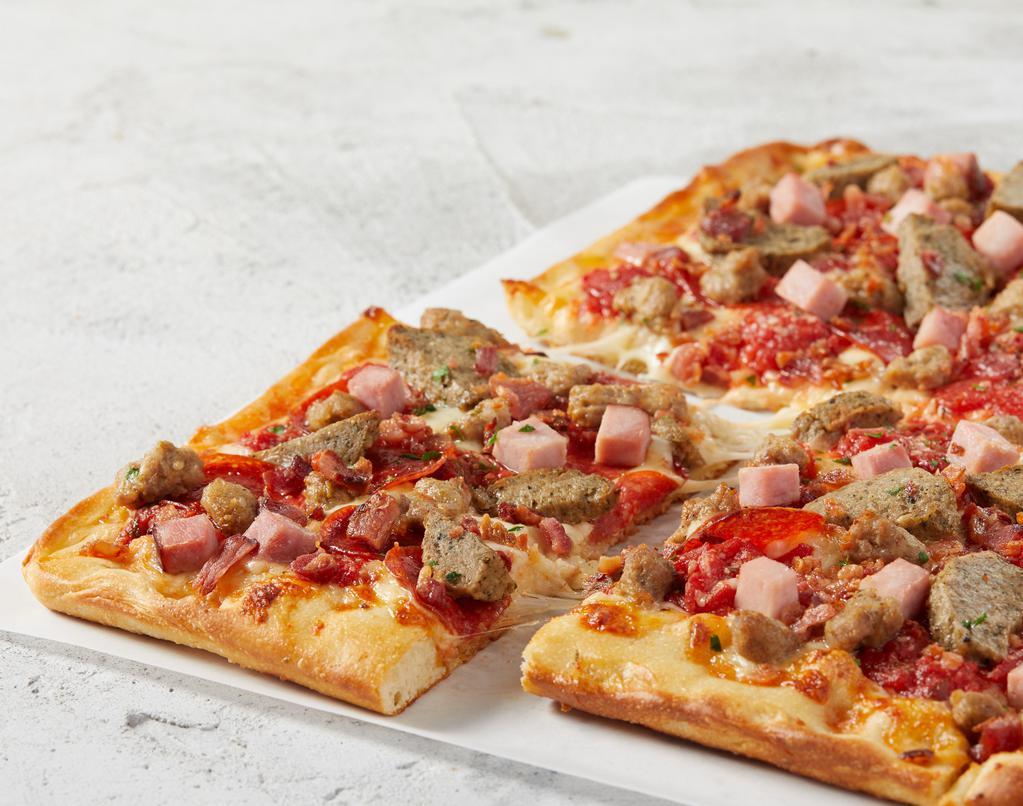 Meat Primo · Thick, Sicilian-style crust, hand-crushed Roman sauce and freshly shredded 100% whole milk Mozzarella. Topped with Meatballs, Italian sausage, pepperoni and ham.
