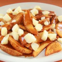 Poutine Fries (Solo) · Check out the Canadian craze!!! Fudd Fries smothered in Cheese Curds and Poutine Gravy. 824 ...