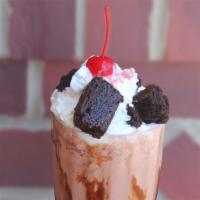 Edy'S Hand Dipped Black Forest Shake · Chocolate Ice Cream, Chocolate Syrup, Dark Sweet Cherries, Fresh Brownie Pieces.