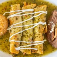 Enchiladas · Three soft corn tortillas topped with cheese, sour cream, and the sauce of your choice Mole ...