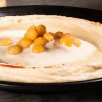 Hummus & Tehina · An Israeli classic, fresh parsley, paprika, olive oil