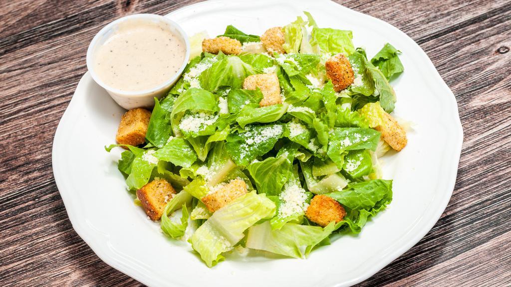 Cesar Salad · Salad, croton, parmesan cheese, Caesar dressing.