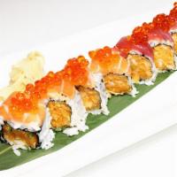 Magic Roll (10 Pieces) · Inside: tuna, salmon, red snapper, crabmeat, and avocado. Outside: cucumber and yuzu sauce.