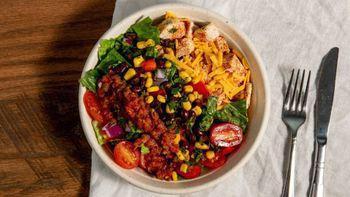 El Chapo Bowl · Cheddar cheese house salsa green peppers red onions romaine tomatoes corn and bean pico de g...