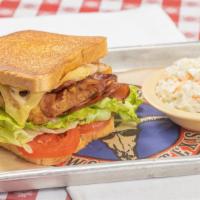 Chicken Club Sandwich Basket · Lightly dusted with our special seasonings, served on a toasted bun with fresh avocado slice...
