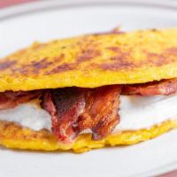 Cachapa Con Queso De Mano Y Bacon · sweet corn cake filled with soft venezuelan cheese and bacon