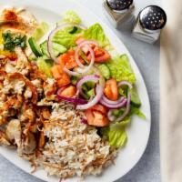 Chicken Shawarma · Marinated chicken. with hummus and choice of salad or rice.