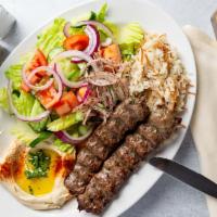Kafta Kabob · Grilled ground beef mixed with parsley, onions and spices.