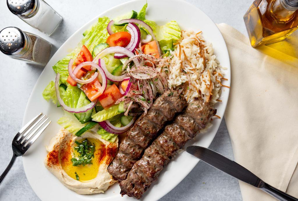 Kafta Kabob · Grilled ground beef mixed with parsley, onions and spices.