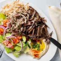 Beef Shawarma · Marinated beef. with hummus and choice of salad or rice.