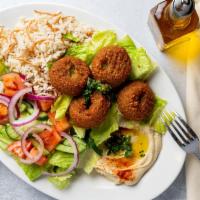 Falafel 4 Pieces · Deep fried crispy patties of fava and garbanzo beans.