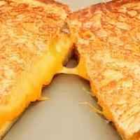 Grilled Cheese · Served with signature house rings cheese on Texas toast.
