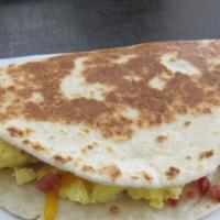 1 Breakfast Taco With Potato Egg And Cheese · Scrambled eggs, melted cheddar and Monterey jack  cheeses
