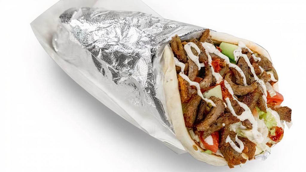 Gyro Wrap · Lettuce, tomato, cucumber, onion, white sauce and spicy sauce.