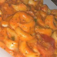Tortellini Pasta · Cheese tortellini served in a creamy alla pana sauce with fresh tomatoes.