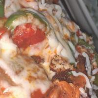 Sausage Pepper Parmigiana · Sliced Italian sausage, sliced bell peppers placed on top of spaghetti pasta and smothered i...