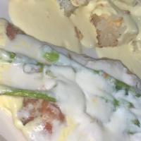 Delizioso · Breaded chicken breast covered in a hollandaise sauce with fresh asparagus, mozzarella chees...
