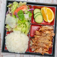Chicken Thigh Bento Box · Grilled chicken thigh meat with rice, green salad, orange and scoops (2) of teriyaki sauce.