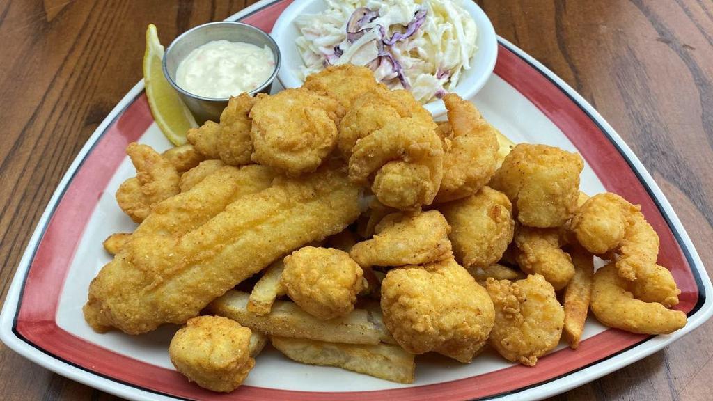Fried Seafood Platter · A heaping platter of delicately fried, hand-breaded shrimp, fish filet and North Atlantic sea scallops. Served with choice of two sides and tartar sauce.