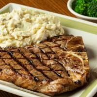T-Bone Steak* · A juicy, flavorful 18 oz. T-Bone steak seasoned and flame broiled to perfection. Served with...