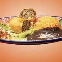 Chimichanga (New) · Your Choice Of Meat Stuffed Into A Fried 10-Inch Flour Tortilla With A Blend Of White & Yell...
