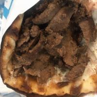 Yeeros (Pita) · A traditional meat marinated and roasted, sourced from local farms, thinly sliced and wrappe...