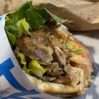 Grillers (Pita) · Authentic Greek dishes of natural meat, marinated and grilled to perfection against an open ...