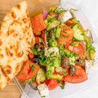 Greek Salad · Vine-ripened tomatoes, onions, green peppers, cucumbers, kalamata olives, and Greek Feta che...