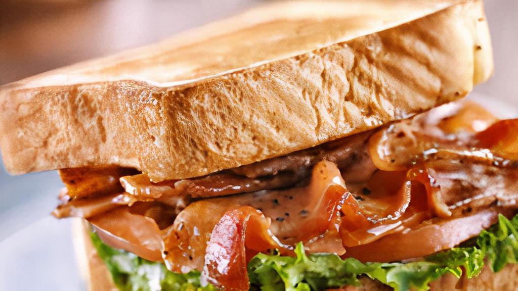 Blt · Delicious crispy thick cut bacon, Fresh tomatoes and Romain lettuce on toasted Texas toast